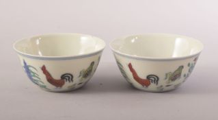 TWO GOOD CHINESE PORCELAIN ROOSTER CUPS, painted with roosters, chicks and flora, both with six