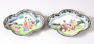 A PAIR OF CHINESE CANTON ENAMELLED DISHES, painted with figures in landscape settings, 9.5cm x 7.