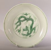 A CHINESE FAMILLE VERTE PORCELAIN DRAGON DISH - the dish upon a white ground with green glazed