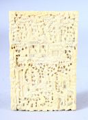 A GOOD CHINESE CANTON CARVED IVORY CARD CASE, carved with figures in a busy landscape, 11.5cm x 7.