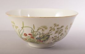 A CHINESE FAMILLE VERTE PORCELAIN BOWL, decorated with native flora, six character mark to base,