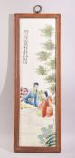 A CHINESE REPUBLIC STYLE PORCELAIN PLAQUE, in a wooden frame, with script upper left, 58cm x 19.