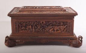 A FINE ANGLO INDIAN CARVED SANDALWOOD BOX, beautifully carved with scenes of animals and figures