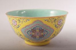 A CHINESE FAMILLE ROSE PORCELAIN BOWL - decorated with panels of geometric style with surrounding