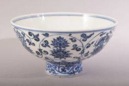 A CHINESE MING STYLE BLUE & WHITE LOTUS PORCELAIN STEM BOWL - The interior with a six character mark