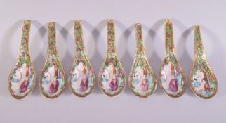 A SET OF SEVEN CHINESE CANTON PORCELAIN SPOONS, each bowl painted with figures, all approx. 13cm