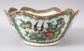 A 19TH CENTURY CHINESE CANTON FAMILLE ROSE PORCELAIN LOBED BOWL - the bowl with a lobed rim,