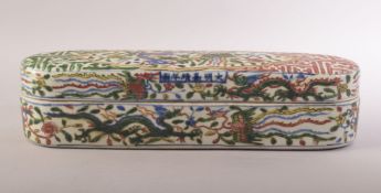 A GOOD LARGE CHINESE DOUCAI PORCELAIN PEN BOX, profusely decorated in the doucai palette with