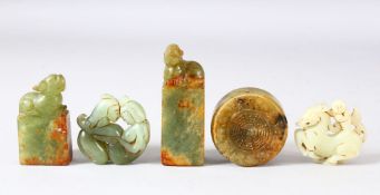 FIVE CHINESE CARVED JADE PIECES, comprising of three seals and two amulets (5).