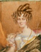 Early 19th Century, A pair of watercolour on ivory portraits of a lady and a gentleman, in fine gilt