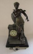 Large French figural mantel clock, brass plaque 'Taendelei' H 56 cm L 29 cm D 22 cm