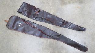A gun slip having leather end and carry handle together with another gun slip.