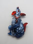 An overlaid plastic brooch in the style of Lea Stein in the form of a dog, 7cm in length.
