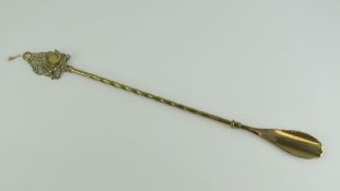 A brass shoe horn having decorative Swan shaped finial, 50.5cm in length.