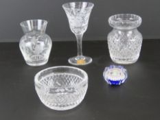 A Waterford Crystal cut glass small bowl, 10cm dia, with matching vase standing 10.