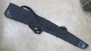 A fleece-lined canvas gun slip by Southern Counties Shooting Ltd, zip a/f.