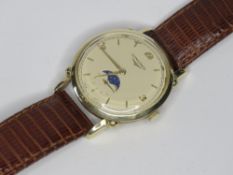 A 14ct gold Longines 1951 Moonphase wristwatch, cream dial with yellow metal hands and batons,