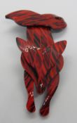 An overlaid plastic brooch in the style of Lea Stein in the form of a fox, 7.5cm in length.