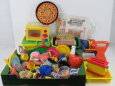 An extensive collection of shop or playhouse plastic food together with shopping baskets,