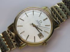 A vintage Omega Automatic gold plated wristwatch having silvered dial with date aperture,