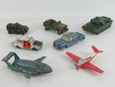 Seven assorted Dinky Toys in play worn condition including; Thunderbird 2, Centurion Tank,