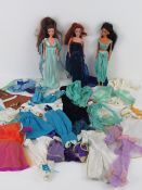 Princess Jasmine doll with a quantity of Jasmine and Aladdin clothing and shoes together with a Meg