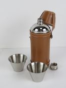 A leatherette covered 8oz hunting flask including two tot cups.