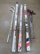 A quantity of 1970s vintage skiing gear including three pairs of Non Cava skis, two pairs of poles.
