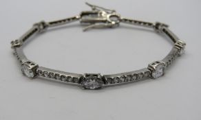 A HM silver bracelet set with white stones, hallmarked 925.