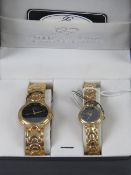 A 'His and Hers' stainless steel gents wristwatch and ladies wristwatch set, in presentation box.
