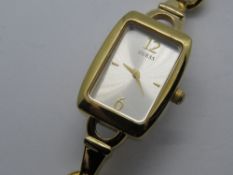 A guess wristwatch with silvered dial, adjustable length strap.