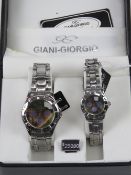 A 'His and Hers' stainless steel gents wristwatch and ladies wristwatch set, in presentation box.