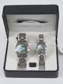 A 'His and Hers' stainless steel gents wristwatch and ladies wristwatch set, in presentation box.