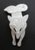An overlaid plastic brooch in the style of Lea Stein in the form of a fox, 7.5cm in length.