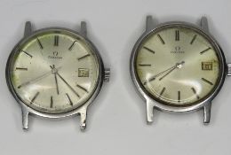 Two vintage Omega watch heads, stainless steel, a/f.