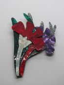 An overlaid plastic brooch in the style of Lea Stein in the form of a floral bouquet,