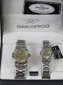 A 'His and Hers' stainless steel gents wristwatch and ladies wristwatch set, in presentation box.