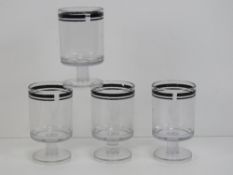 A set of four Coal and Mason picnic wine glasses standing 11.5cm high.