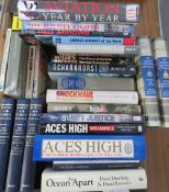A box containing a quantity of assorted military and aviation themed books.