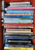 A box containing a quantity of assorted military and aviation themed books.