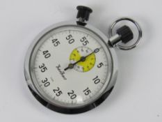 A Hanhart stopwatch, white dial, seven jewel movement, having original label to back.
