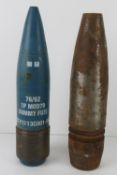 An inert British 76mm TP MOD79 with dummy fuse together with an inert 85mm Eastern bloc projectile.