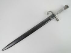A WWII Argentinean Mauser bayonet with scabbard, blade and scabbard both numbered A8879.