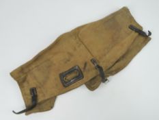 A WWII German MG42 canvas breach cover with leather straps.
