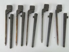 Four No.4 spike bayonets with scabbards.