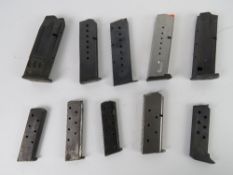A quantity of ten assorted pistol magazines inc one being a .45cal, one Spanish made, one 7.