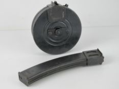 A PPSH-41 drum magazine together with a PPS-43 stick magazine. Two items.