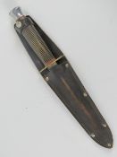 A 'Black Eagle' commando style dagger having Sheffield made blade, with leather sheath/frog.