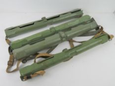 Four MG42 spare barrel cases with canvas carry straps.