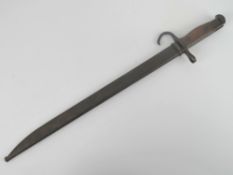 A WWII Japanese Arisaka bayonet with scabbard.